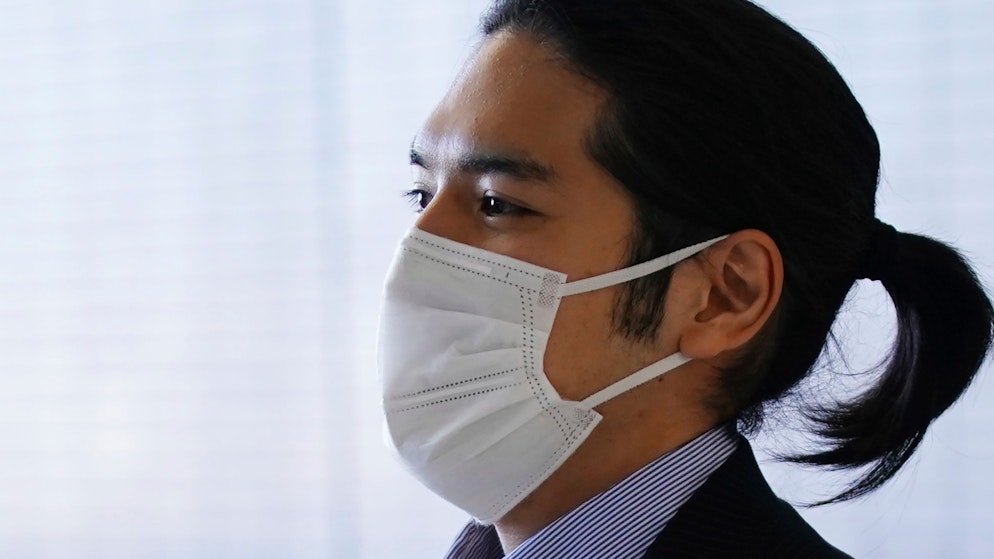 Kei Komuro, the fiance of Princess Mako of Japan, returns to Japan from the United States and arrives at Narita International Airport in Narita, near Tokyo, on Monday, September 27, 2021.  (AB Photo / Eugene Hoshiko)